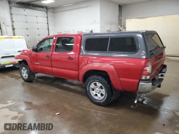 ✅ 2012 Toyota Tacoma • VIN: 3TMLU4EN8CM084471 • Lot: 84811765. Listed on Copart with 121,598 mi. Free auction sales archive from the USA and detailed vehicle history report at DreamBid. Image 2.
