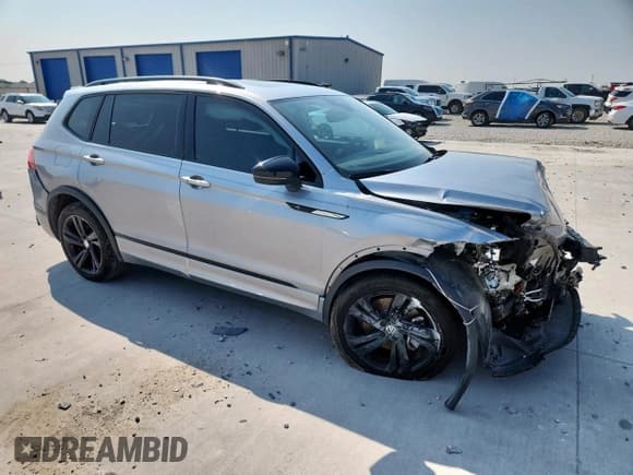 ✅ 2024 Volkswagen Tiguan SE R-Line Black • VIN: 3VVCB7AX7RM054192 • Лот: 71907165. Опубликован ранее на Copart с пробегом 20 299 миль. Бесплатный доступ к архиву аукционных продаж из США и подробный отчёт об истории автомобиля на DreamBid. Изображение 4.