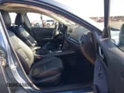 ✅ 2014 Mazda 3 i Grand Touring • VIN: JM1BM1M73E1200849 • Lot: 42789321. Listed on IAAI with 69,561 mi. Free auction sales archive from the USA and detailed vehicle history report at DreamBid. Image 5.