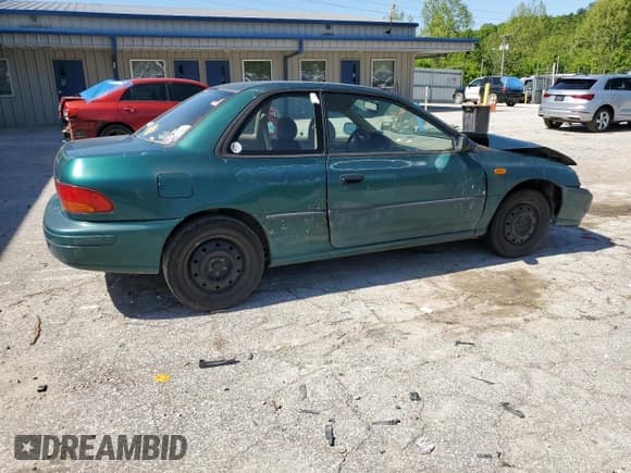 ✅ 1997 Subaru Impreza • VIN: JF1GM4255VH401478 • Lot: 56221515. Listed on Copart with 75,202 mi. Free auction sales archive from the USA and detailed vehicle history report at DreamBid. Image 3.