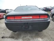 ✅ 2013 Dodge Challenger SXT Plus • VIN: 2C3CDYAG0DH605086 • Лот: 75988064. Опубликован ранее на Copart с пробегом 226 365 миль. Бесплатный доступ к архиву аукционных продаж из США и подробный отчёт об истории автомобиля на DreamBid. Изображение 6.
