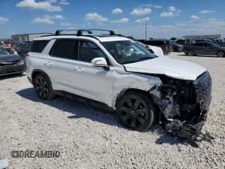 2023 Hyundai Palisade XRT с VIN KM8R34GE7PU556151, выставлен на аукционе Copart как лот 67518644 с пробегом 33 553 миль миль и Списание • Salvage title. История ставок и продаж доступна на DreamBid. Изображение 4.