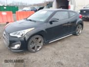 ✅ 2014 Hyundai Veloster Turbo • VIN: KMHTC6AE3EU182516 • Lot: 43800972. Listed on IAAI with 154,171 mi. Free auction sales archive from the USA and detailed vehicle history report at DreamBid. Image 2.