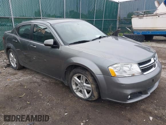 ✅ 2013 Dodge Avenger SXT • VIN: 1C3CDZCG0DN521540 • Lot: 40772548. Listed on IAAI with 145,455 mi. Free auction sales archive from the USA and detailed vehicle history report at DreamBid. Image 1.