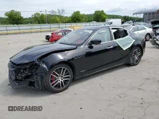 ✅ 2018 Maserati Ghibli S Q4 GranLusso • VIN: ZAM57YTL1J1304614 • Лот: 49873973. Опубликован ранее на Copart с пробегом 41 200 миль. Бесплатный доступ к архиву аукционных продаж из США и подробный отчёт об истории автомобиля на DreamBid. Изображение 1.
