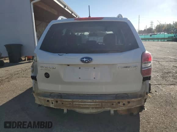 2015 Subaru Forester Premium with VIN JF2SJADC4FH464470, listed as a Copart auction lot 84954675 with 148,219 mi miles and Salvage title. Bid and sale history available at DreamBid. Image 6.