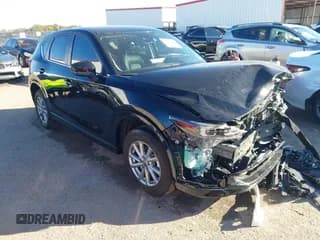 ✅ 2025 Mazda CX-5 S Carbon Edition • VIN: JM3KFBCM7S0690275 • Лот: 43591248. Опубликован ранее на IAAI с пробегом 4 239 миль. Бесплатный доступ к архиву аукционных продаж из США и подробный отчёт об истории автомобиля на DreamBid. Изображение 1.