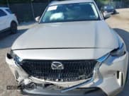 ✅ 2024 Mazda CX-90 Preferred Plus • VIN: JM3KKCHD5R1103456 • Lot: 42659981. Wystawiony na IAAI z przebiegiem 20 135 mil. Bezpłatny archiwum sprzedaży aukcyjnych z USA i szczegółowy raport historii pojazdu na DreamBid. Zdjęcie 10.