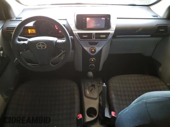 ✅ 2014 Scion iQ • VIN: JTNJJXB07EJ029340 • Лот: 61567245. Опубликован ранее на Copart с пробегом 17 315 миль. Бесплатный доступ к архиву аукционных продаж из США и подробный отчёт об истории автомобиля на DreamBid. Изображение 8.