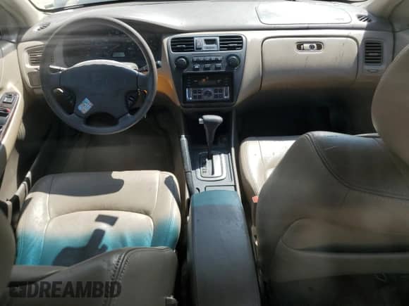 2002 Honda Accord EX с VIN 1HGCG56682A104803, выставлен на аукционе Copart как лот 70052125 с пробегом 277 321 миль миль и Списание • Salvage title. История ставок и продаж доступна на DreamBid. Изображение 8.