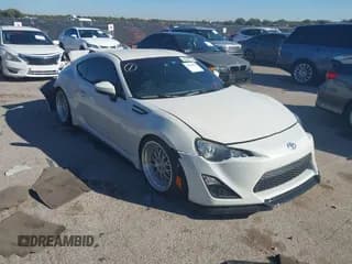 ✅ 2015 Subaru BRZ Premium • VIN: JF1ZCAB14F9603103 • Lot: 43570355. Listed on IAAI with 113,928 mi. Free auction sales archive from the USA and detailed vehicle history report at DreamBid. Image 1.