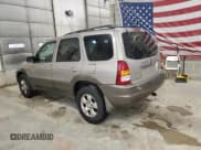 ✅ 2001 Mazda Tribute LX • VIN: 4F2CU08101KM05943 • Lot: 84077694. Wystawiony na Copart z przebiegiem 137 937 mil. Bezpłatny archiwum sprzedaży aukcyjnych z USA i szczegółowy raport historii pojazdu na DreamBid. Zdjęcie 2.