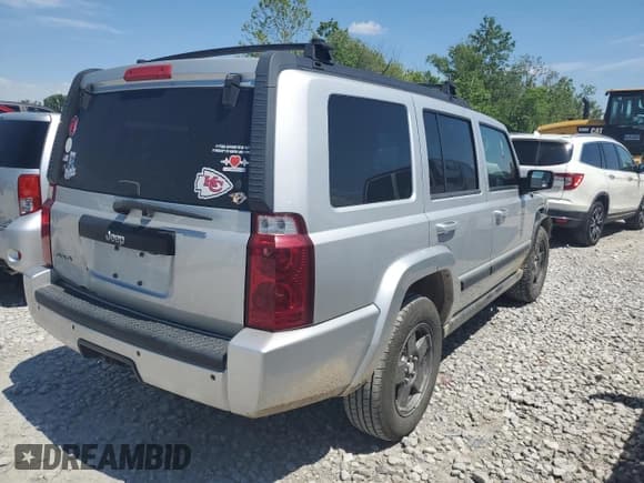 ✅ 2009 Jeep Commander Sport • VIN: 1J8HG48K59C519271 • Lot: 57624725. Listed on Copart with 163,506 mi. Free auction sales archive from the USA and detailed vehicle history report at DreamBid. Image 3.