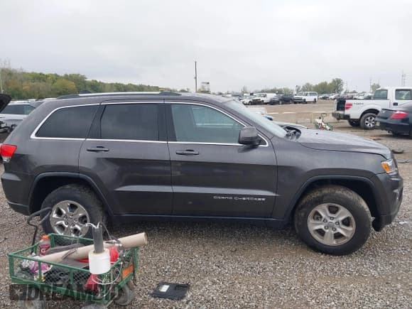 ✅ 2015 Jeep Grand Cherokee Laredo • VIN: 1C4RJFAGXFC171154 • Лот: 43286818. Опубликован ранее на IAAI с пробегом 136 453 миль. Бесплатный доступ к архиву аукционных продаж из США и подробный отчёт об истории автомобиля на DreamBid. Изображение 13.