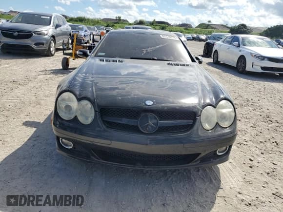 ✅ 2007 Mercedes-Benz SL 550 • VIN: WDBSK71F77F119278 • Лот: 82618215. Опубликован ранее на Copart с пробегом 166 217 миль. Бесплатный доступ к архиву аукционных продаж из США и подробный отчёт об истории автомобиля на DreamBid. Изображение 5.