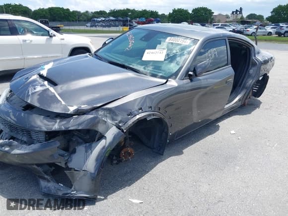 ✅ 2022 Dodge Charger Scat Pack Widebody • VIN: 2C3CDXGJ6NH173439 • Lot: 42462542. Wystawiony na IAAI z przebiegiem 27 119 mil. Bezpłatny archiwum sprzedaży aukcyjnych z USA i szczegółowy raport historii pojazdu na DreamBid. Zdjęcie 21.