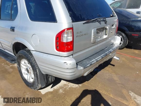 ✅ 2002 Isuzu Rodeo S • VIN: 4S2CK58WX24321556 • Lot: 41405981. Listed on IAAI with 172,590 mi. Free auction sales archive from the USA and detailed vehicle history report at DreamBid. Image 6.