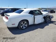 ✅ 2013 Dodge Challenger SXT • VIN: 2C3CDYAG0DH596373 • Lot: 68378504. Wystawiony na Copart z przebiegiem Nie podano. Bezpłatny archiwum sprzedaży aukcyjnych z USA i szczegółowy raport historii pojazdu na DreamBid. Zdjęcie 3.