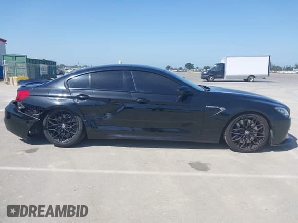 ✅ 2014 BMW M6 • VIN: WBS6C9C52EDV73651 • Lot: 42110470. Listed on IAAI with 127,576 mi. Free auction sales archive from the USA and detailed vehicle history report at DreamBid. Image 13.