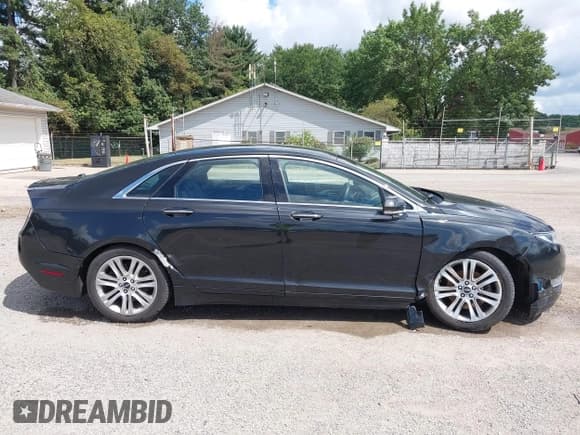 ✅ 2015 Lincoln MKZ • VIN: 3LN6L2G94FR625555 • Lot: 43052508. Listed on IAAI with 103,338 mi. Free auction sales archive from the USA and detailed vehicle history report at DreamBid. Image 13.