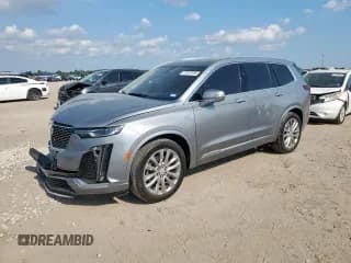 ✅ 2023 Cadillac XT6 FWD Premium Luxury • VIN: 1GYKPCRS7PZ111896 • Lot: 71973155. Wystawiony na Copart z przebiegiem 32 388 mil. Bezpłatny archiwum sprzedaży aukcyjnych z USA i szczegółowy raport historii pojazdu na DreamBid. Zdjęcie 1.