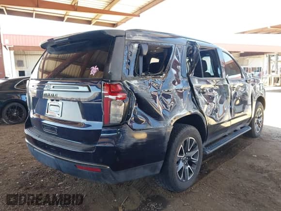 2022 Chevrolet Tahoe Z71 z VIN 1GNSKPKD3NR328938, wystawiony jako IAAI lot #42724313 z przebiegiem 46 394 mil mil oraz . Historia ofert i sprzedaży dostępna na DreamBid. Obrazek 18.