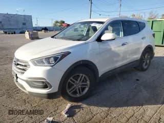 ✅ 2018 Hyundai Santa Fe 2.4L • VIN: 5NMZT3LB1JH080987 • Лот: 91037705. Опубликован ранее на Copart с пробегом Не указан. Бесплатный доступ к архиву аукционных продаж из США и подробный отчёт об истории автомобиля на DreamBid. Изображение 1.