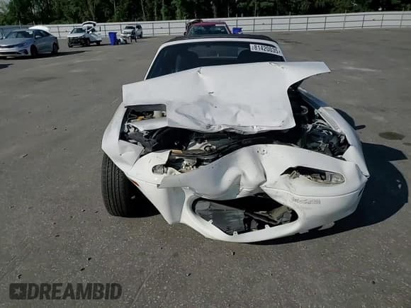 ✅ 1991 Mazda MX-5 Miata Special Edition • VIN: JM1NA351XM1214130 • Lot: 81420035. Listed on Copart with 198,260 mi. Free auction sales archive from the USA and detailed vehicle history report at DreamBid. Image 12.