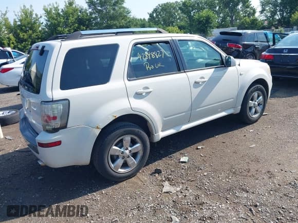 ✅ 2009 Mercury Mariner Premier • VIN: 4M2CU87G99KJ26338 • Лот: 42848827. Опубликован ранее на IAAI с пробегом 153 553 миль. Бесплатный доступ к архиву аукционных продаж из США и подробный отчёт об истории автомобиля на DreamBid. Изображение 4.