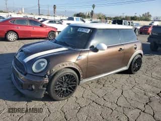 2012 MINI Hardtop S with VIN WMWSV3C53CTY27199, listed as a Copart auction lot 87487745 with 101,609 mi miles and Salvage title. Bid and sale history available at DreamBid. Image 1.