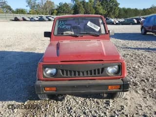 ✅ 1986 Suzuki Samurai Deluxe • VIN: JS3JC51V5G4109478 • Lot: 75529664. Wystawiony na Copart z przebiegiem 68 547 mil. Bezpłatny archiwum sprzedaży aukcyjnych z USA i szczegółowy raport historii pojazdu na DreamBid. Zdjęcie 5.