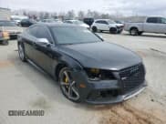 ✅ 2015 Audi RS 7 • VIN: WUAW2CFC0FN900483 • Лот: 47700525. Опубликован ранее на Copart с пробегом 107 260 миль. Бесплатный доступ к архиву аукционных продаж из США и подробный отчёт об истории автомобиля на DreamBid. Изображение 4.