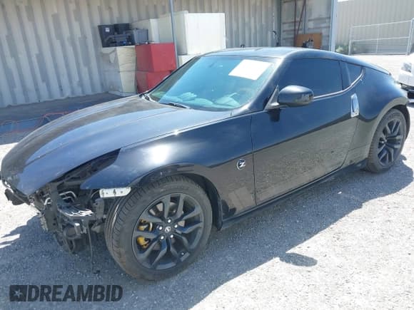 ✅ 2019 Nissan 370Z Sport Touring • VIN: JN1AZ4EH1KM420719 • Lot: 42096816. Wystawiony na IAAI z przebiegiem 97 803 mil. Bezpłatny archiwum sprzedaży aukcyjnych z USA i szczegółowy raport historii pojazdu na DreamBid. Zdjęcie 2.