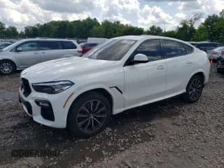 ✅ 2021 BMW X6 xDrive40i • VIN: 5UXCY6C04M9F92705 • Лот: 61234993. Опубликован ранее на Copart с пробегом 75 842 миль. Бесплатный доступ к архиву аукционных продаж из США и подробный отчёт об истории автомобиля на DreamBid. Изображение 1.