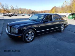 ✅ 2001 Bentley Arnage • VIN: SCBLC31E21CX05644 • Lot: 77706154. Wystawiony na Copart z przebiegiem 57 446 mil. Bezpłatny archiwum sprzedaży aukcyjnych z USA i szczegółowy raport historii pojazdu na DreamBid. Zdjęcie 1.