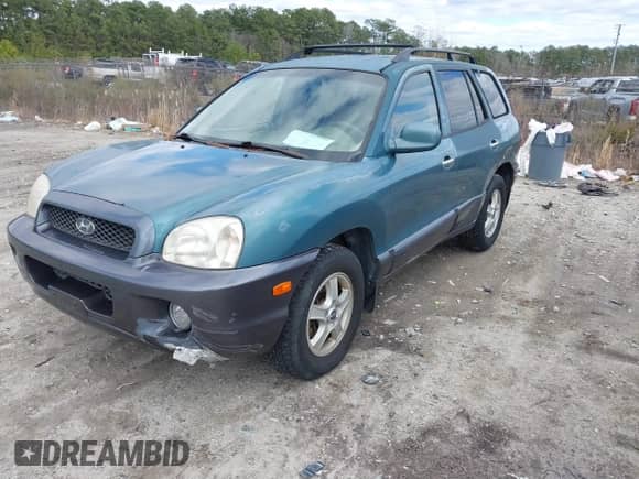 2002 Hyundai Santa Fe GLS with VIN KM8SC73D22U245851, listed as a IAAI auction lot 41733222 with 184,179 mi miles and . Bid and sale history available at DreamBid. Image 2.