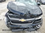 ✅ 2018 Chevrolet Colorado 4WD Z71 • VIN: 1GCGTDEN2J1213450 • Лот: 70975404. Опубликован ранее на Copart с пробегом 46 307 миль. Бесплатный доступ к архиву аукционных продаж из США и подробный отчёт об истории автомобиля на DreamBid. Изображение 13.