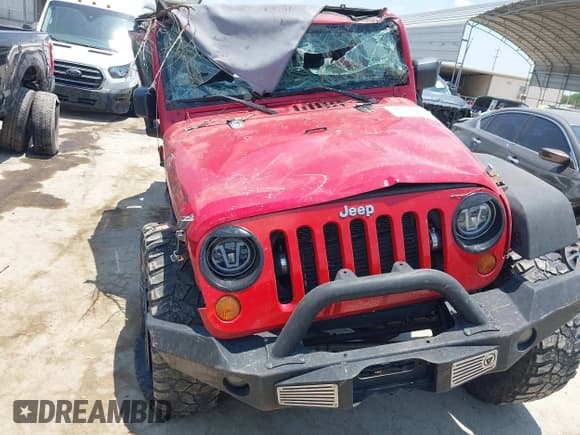 ✅ 2007 Jeep Wrangler X • VIN: 1J4GA39127L154527 • Lot: 42316655. Listed on IAAI with 126,124 mi. Free auction sales archive from the USA and detailed vehicle history report at DreamBid. Image 12.