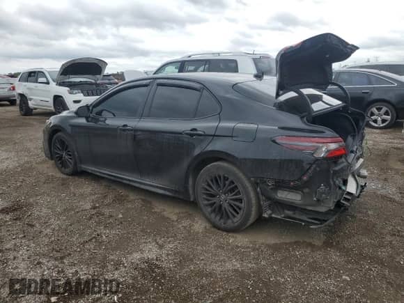 2022 Toyota Camry SE with VIN 4T1T11BK7NU070959, listed as a Copart auction lot 71006025 with 63,775 mi miles and Salvage title. Bid and sale history available at DreamBid. Image 2.