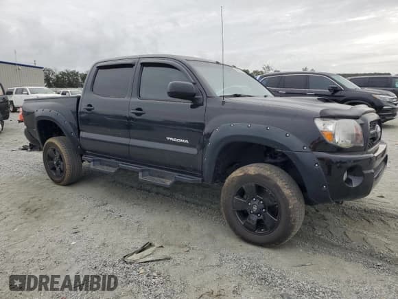 ✅ 2011 Toyota Tacoma • VIN: 5TFLU4EN5BX004763 • Lot: 82220995. Listed on Copart with 137,354 mi. Free auction sales archive from the USA and detailed vehicle history report at DreamBid. Image 4.