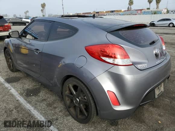 2016 Hyundai Veloster z VIN KMHTC6AD9GU260582, wystawiony jako Copart lot #71878294 z przebiegiem 83 155 mil mil oraz Szkoda całkowita • Salvage title. Historia ofert i sprzedaży dostępna na DreamBid. Obrazek 2.