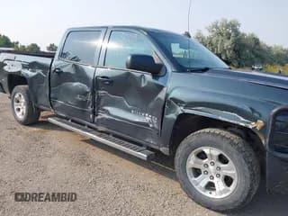 ✅ 2018 Chevrolet Silverado 1500 LT • VIN: 3GCUKREC9JG449662 • Lot: 43138053. Wystawiony na IAAI z przebiegiem 246 548 mil. Bezpłatny archiwum sprzedaży aukcyjnych z USA i szczegółowy raport historii pojazdu na DreamBid. Zdjęcie 6.
