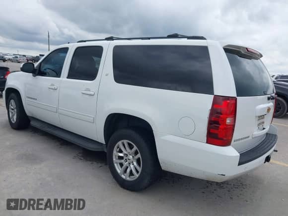2014 Chevrolet Suburban LT z VIN 1GNSCJE02ER153469, wystawiony jako IAAI lot #42481563 z przebiegiem 249 441 mil mil oraz . Historia ofert i sprzedaży dostępna na DreamBid. Obrazek 3.
