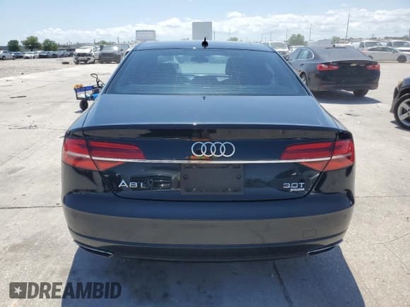 ✅ 2018 Audi A8 • VIN: WAU44AFD0JN000880 • Лот: 54751235. Опубликован ранее на Copart с пробегом 76 161 миль. Бесплатный доступ к архиву аукционных продаж из США и подробный отчёт об истории автомобиля на DreamBid. Изображение 6.