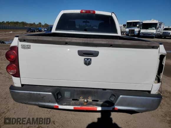 2007 Dodge 1500 ST z VIN 1D7HA18K97J583500, wystawiony jako Copart lot #84458264 z przebiegiem 156 636 mil mil oraz Szkoda całkowita • Salvage title. Historia ofert i sprzedaży dostępna na DreamBid. Obrazek 6.