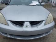 ✅ 2004 Mitsubishi Lancer LS • VIN: JA3AJ36E44U020349 • Lot: 41714325. Listed on IAAI with Not provided. Free auction sales archive from the USA and detailed vehicle history report at DreamBid. Image 10.