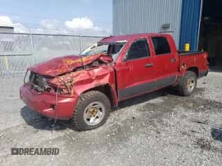 2008 Dodge Dakota с VIN 1D7HW38N68S516999, выставлен на аукционе Copart как лот 45279814 с пробегом Не указан миль и Чистый • Clean title. История ставок и продаж доступна на DreamBid. Изображение 1.