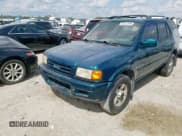 ✅ 1999 Isuzu Rodeo S • VIN: 4S2CK58W6X4366887 • Lot: 47527309. Listed on Copart with 177,199 mi. Free auction sales archive from the USA and detailed vehicle history report at DreamBid. Image 2.