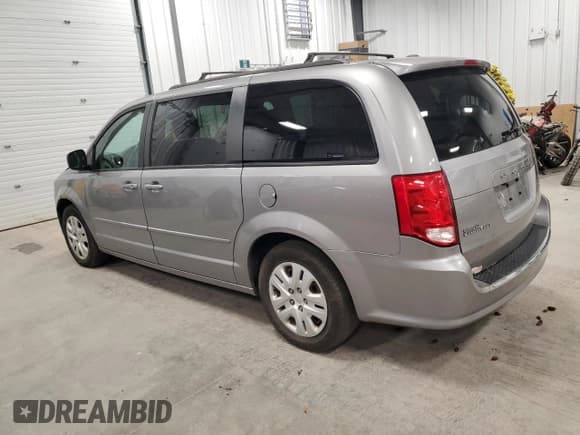 ✅ 2016 Dodge Grand Caravan SE • VIN: 2C4RDGBGXGR135078 • Lot: 87413455. Listed on Copart with 120,073 mi. Free auction sales archive from the USA and detailed vehicle history report at DreamBid. Image 2.