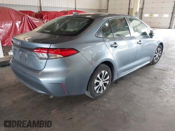 ✅ 2022 Toyota Corolla Hybrid LE • VIN: JTDEAMDE5N3011629 • Lot: 43001535. Listed on IAAI with 34,385 mi. Free auction sales archive from the USA and detailed vehicle history report at DreamBid. Image 4.